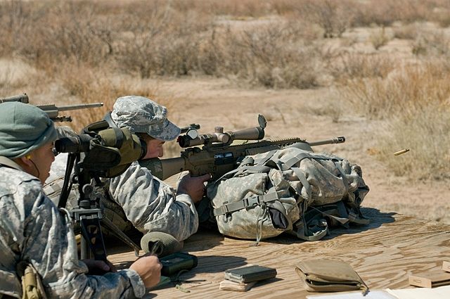 US Army Sniper School trainees aiming sniper rifles