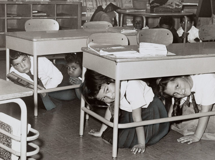 Students hiding under their desks