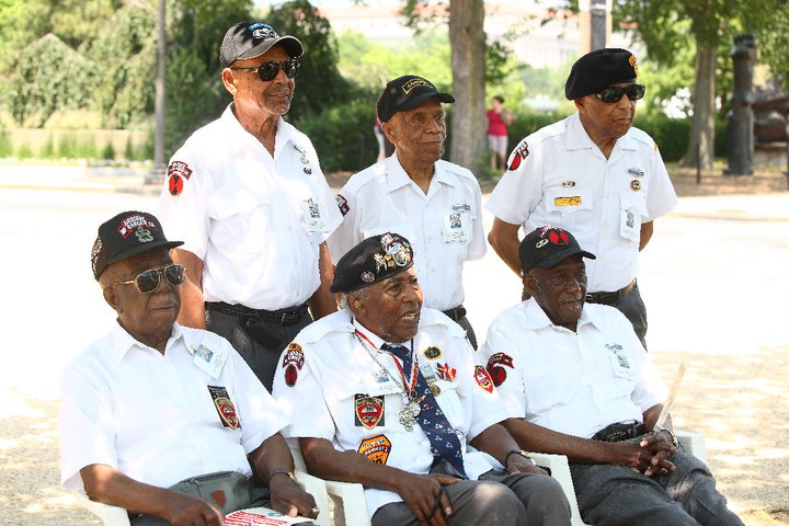 Six veterans of the Buffalo Rangers posing for a photo
