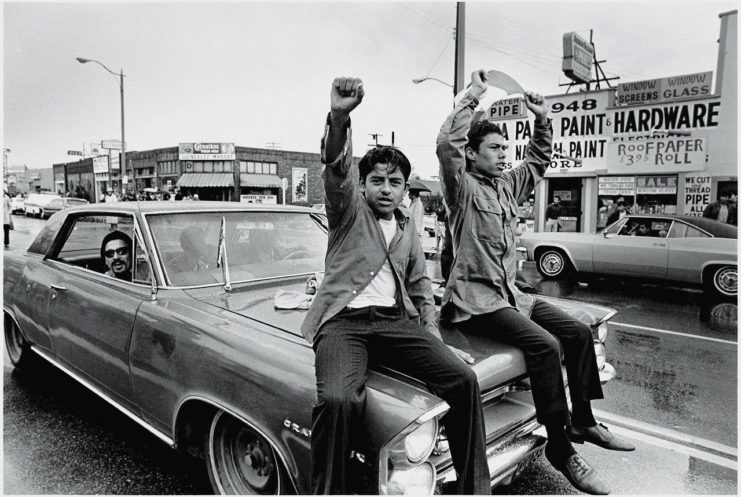 Two young men participate in the National Chicano Moratorium Committee march