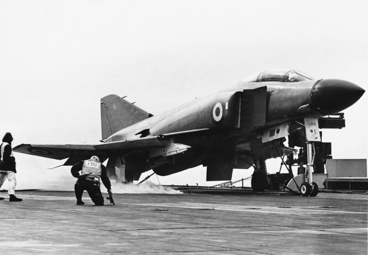 Crew preparing a McDonnell Douglas F-4 Phantom II for takeoff