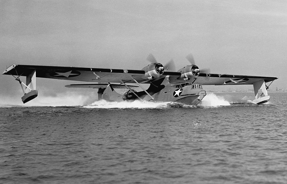 Consolidated PBY-5 Catalina patrol bomber taking off on water