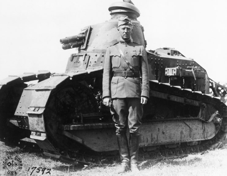 George Patton stands in front of a tank during World War I