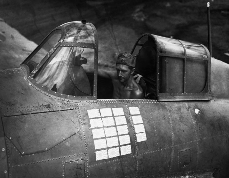 A U.S. pilot sits in a Grumman F4F Wildcat