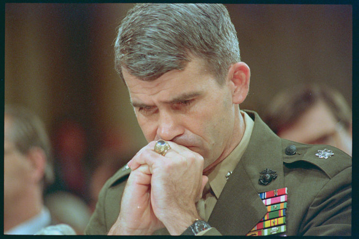 Oliver North testifies during the Senate Iran Contra hearings 