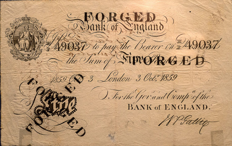 Forged British £5 banknote