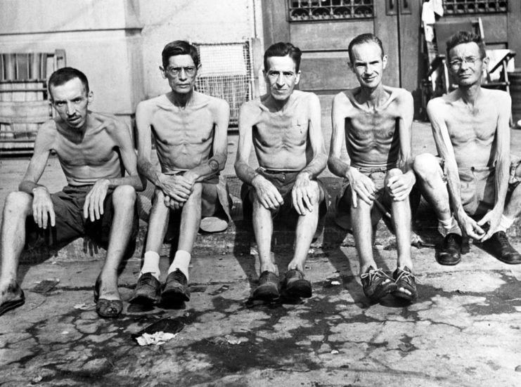 Emaciated prisoners from the Santo Tomas internment camp are photographed