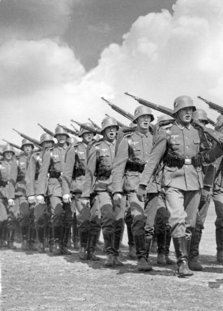 German troops marching with weapons over their shoulders