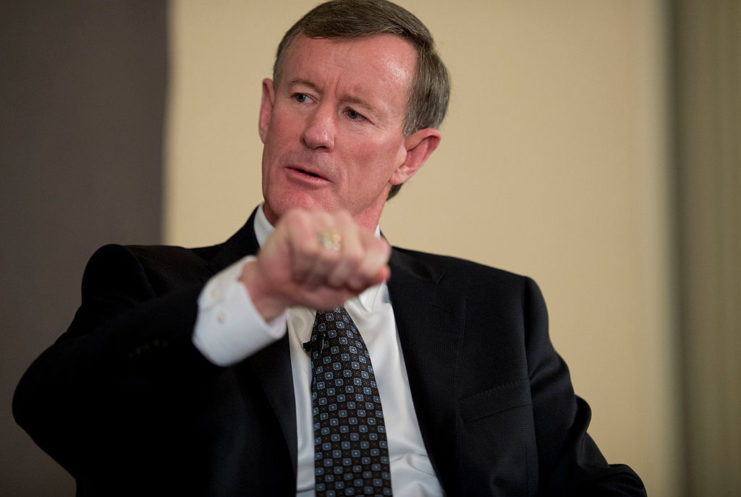 William McRaven gesturing as if he's driving a car