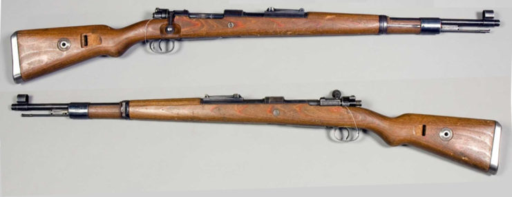Two Mauser Karabiner 98k rifles that are on display at the Swedish Army Museum