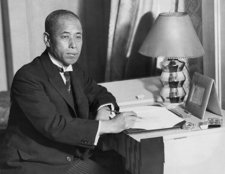 Isoroku Yamamoto sitting at his desk