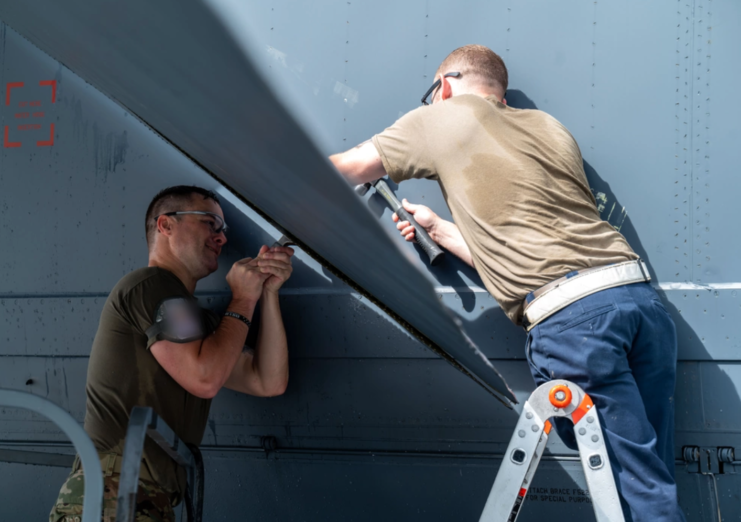 Maintenance crew working on a B-52 Stratofortress