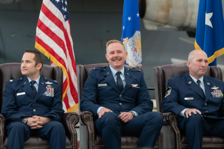 Lt. Col. Dominic Calderon, 1st Lt. Kyle Anderson and Master Sgt. Silva Foster sitting in chairs
