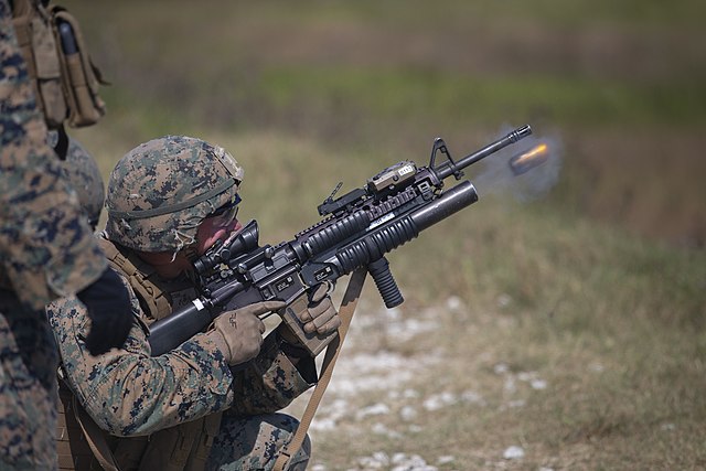 US Marine firing an M203 grenade launcher