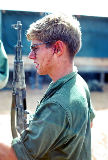 US Marine holding an AK-47