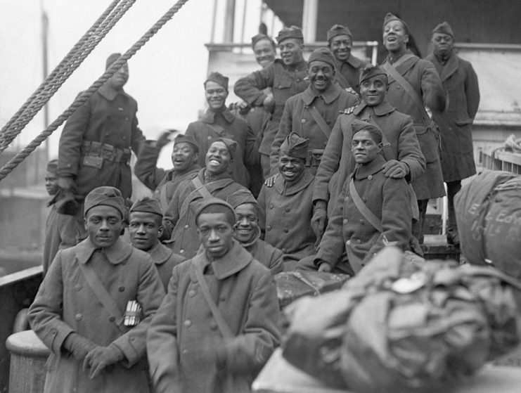Members of the 369th Infantry Regiment standing together