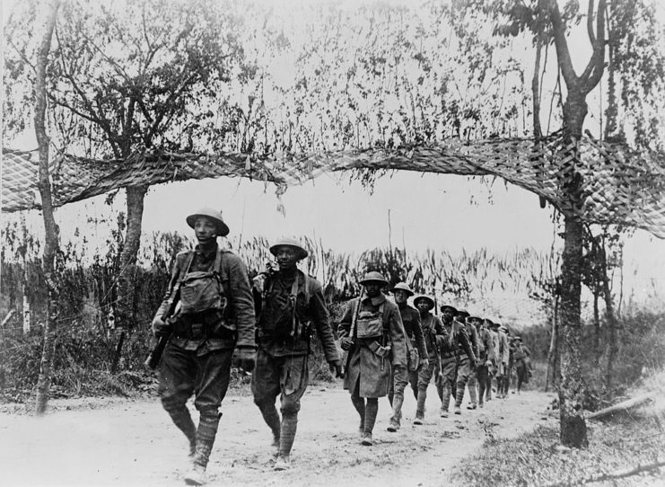 African-American troops marching down a path
