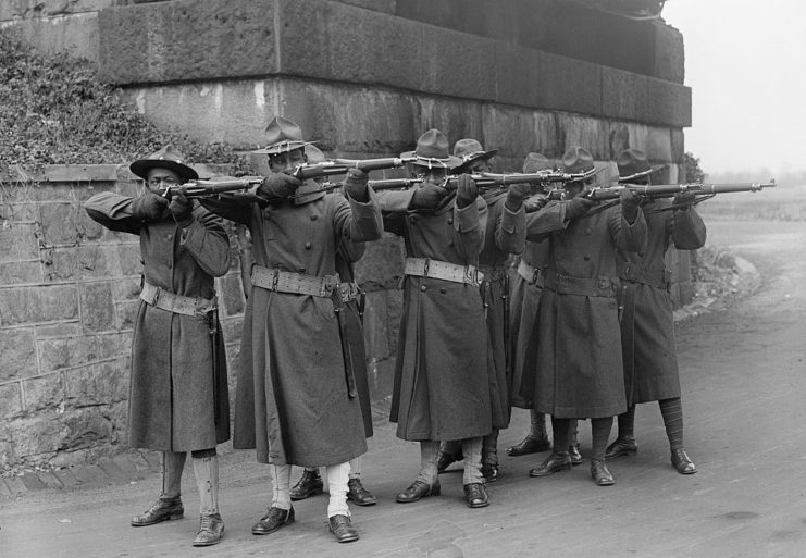 African-American troops aiming their rifles