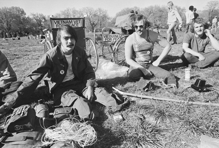 Bill Wyman and Kim Dehlin sitting in the grass