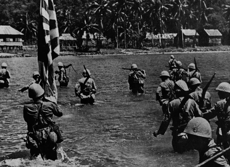 Japanese soldiers wade in the Pacific during World War II