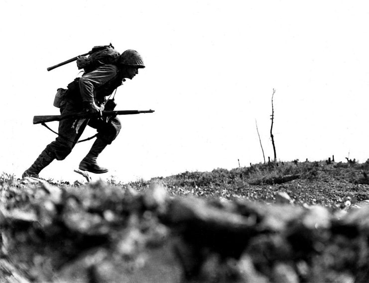 A US soldier comes under fire during the Battle of Okinawa