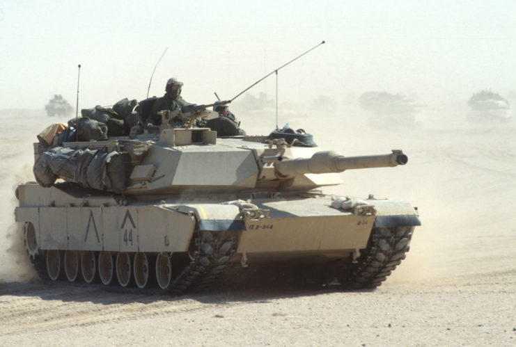 American M1A1 Abrams tank driving through the desert