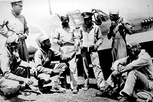 Tuskegee Airmen standing together