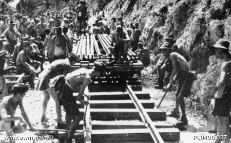 Burma-Thailand_Railway._c._1943._Prisoners_of_war__POWs__laying_railway_track_1943-2