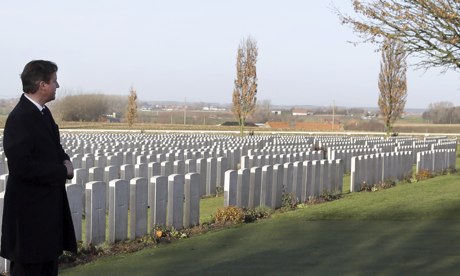 David Cameron at the graves of first world war soldiers in Tyne Cot cemetery in Zonnebeke, Belgium