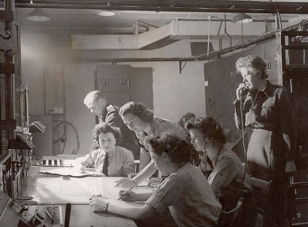 Radar operators at work in one of the radar stations in WWII. The two women's works had been like these in their WAAF days.