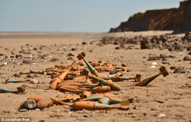 Vintage ammunition unearthed courtesy of the series of storms which battered British coastline recently, (Photo: Daily Mail/Jonathan Pow)
