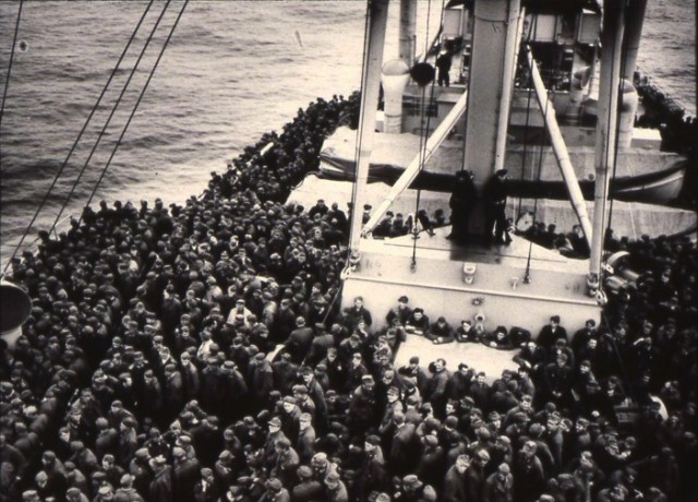 Thousands of German POWs are transported on an American Liberty ship to prison camps in the US