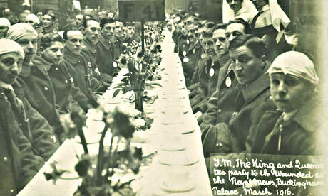 Royal Tea Party with Wounded WWI Soldiers: King George V with Queen Mary had a tea party with the wounded sailors and soldiers March 1916 at the Royal Mews. (Photo: Christina Broom/Museum of London)
