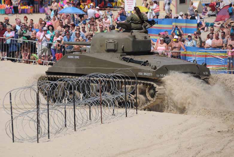 Jim’s Sherman impresses the crowd kicking sand on Weymouth beach