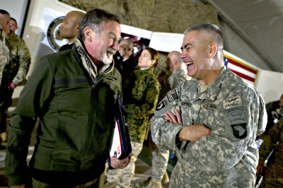 The actor sharing a laugh with US Army Lt. General John F. Campbell.
