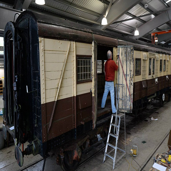 Anthony Coulls working on the train carriage.