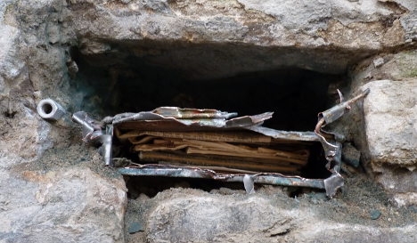 The WWI time capsule the builders found inside the wall of the old German castle.