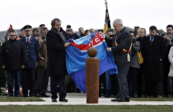The Unveiling of the Christmas Truce football monument by UEFA Pres. Michel Platini and local Mayor Gilbert Deleu.