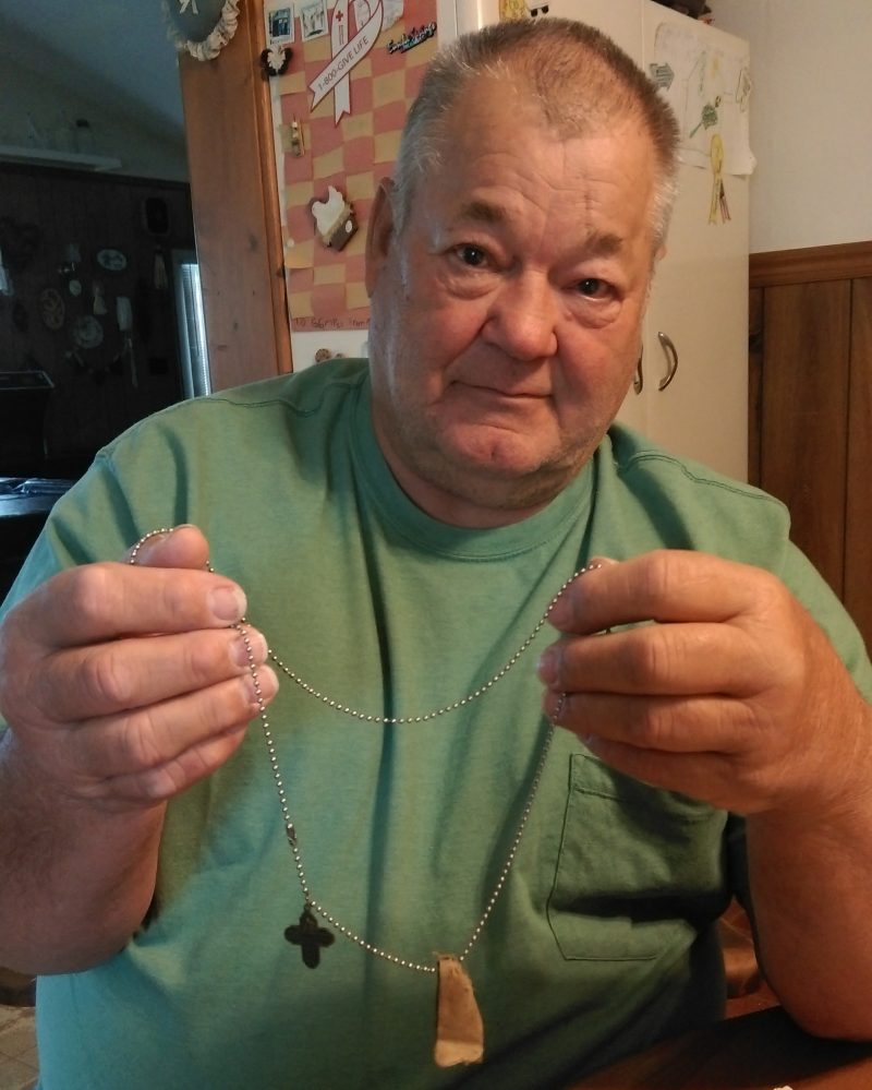Russellville, Mo., veteran Roger Thompson holds a piece of the pin from a rocket that could have killed him in Vietnam. Courtesy of Jeremy P. Ämick