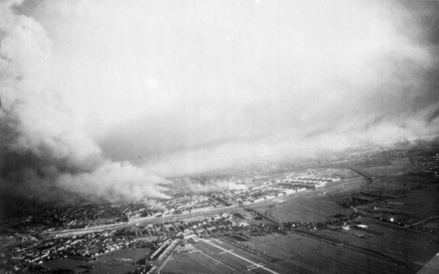 Aerial shot of the burning city of Rotterdam. The Germans bomber Rotterdam to force it's surrender.