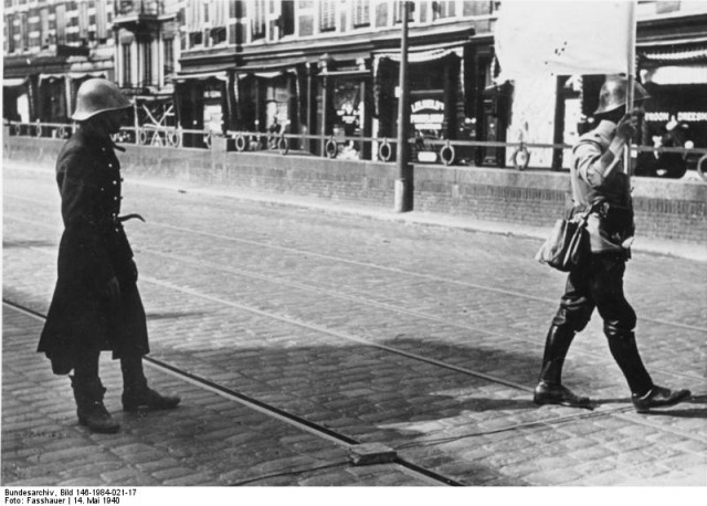 The capitulation of Rotterdam,  a Dutch envoy enters German lines to discuss terms.