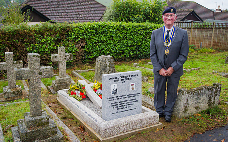 The restored grave of Col. Charles Grant with Dave O'Connor.