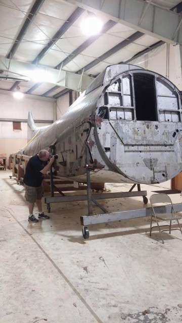 Alliance group photographer Bryan Heim beginning the long process of photo documenting the next phase of the restoration of our B-17 the Lacey Lady - Facebook 