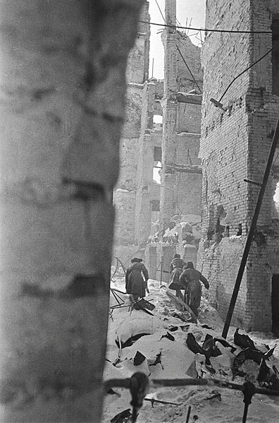 “Destroyed Stalingrad”. Soviet soldiers making their way through the ruins of Stalingrad.