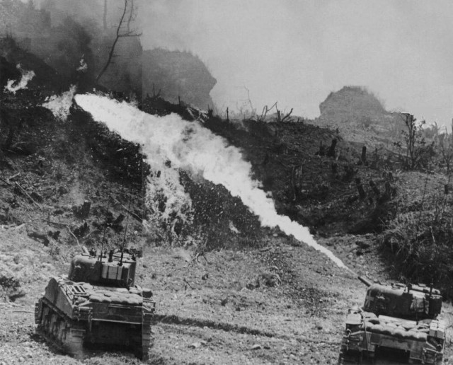 flushing-out-Japanese-with-napalm_Okinawa_1945