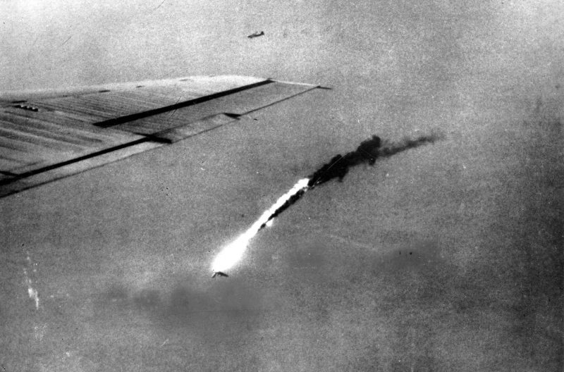 With one wing gone, a B-29 falls in flames after a direct hit by enemy flak over Japan. (U.S. Air Force photo)