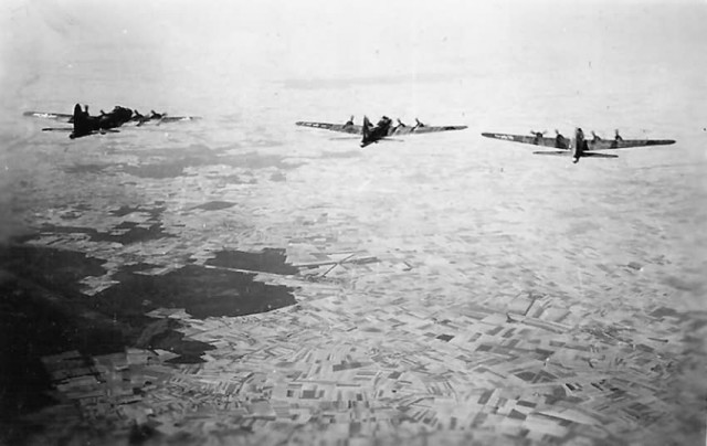 Rear_Aerial_View_of_Trio_of_B-17_Bombers_Heading_To_Target