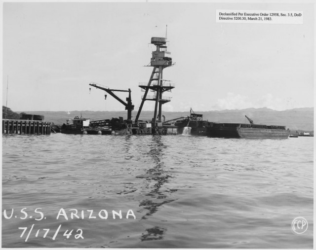 USS Arizona: collection of photographs of salvage operations at Pearl Harbor Naval Shipyard taken by the shipyard during the period following the Japanese attack on Pearl Harbor which initiated US participation in World War II. The photographs are found in a number of files in several shipyard records series.