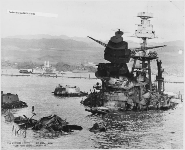 USS Arizona: collection of photographs of salvage operations at Pearl Harbor Naval Shipyard taken by the shipyard during the period following the Japanese attack on Pearl Harbor which initiated US participation in World War II. The photographs are found in a number of files in several shipyard records series.