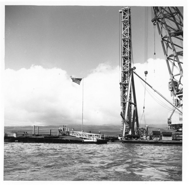 ViewoftheearlystagesofconstructionoftheUSSArizonaMemorialinPearlHarbortakenduringthe1950s_zpsf465699c